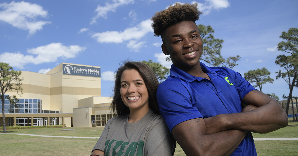 Two smiling EFSC students standing back to back with "Eastern Florida State College" written on a building in the background. It symbolizes Academic Success 101.