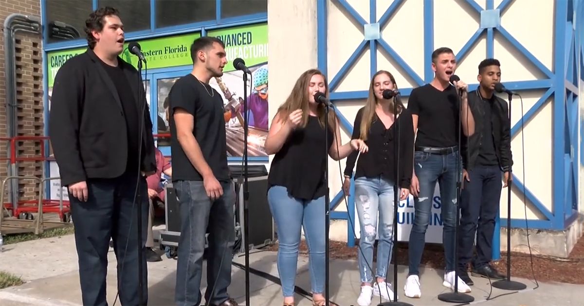Six EFSC students singing in a cappella group "Between the Lines".