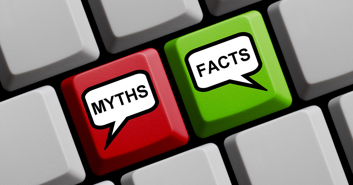 Computer keyboard with speech bubble symbols on red and green key showing Myths and Facts. It symbolizes career center myths debunked.