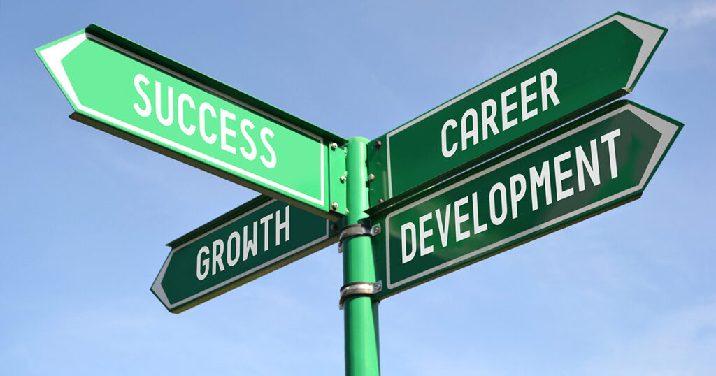 A street sign with the street names that say "Growth, Success, Career, Development," representing college career advice.