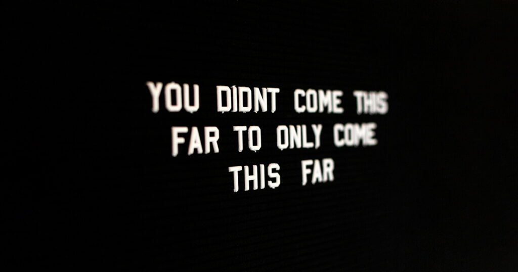 White text on black that reads "You didn't come this far to only come this far". It brings to mind the reality of Imposter Syndrome in college.