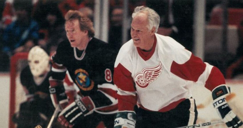 Three men playing hockey in the movie "The Mighty Ducks," including Jack White.