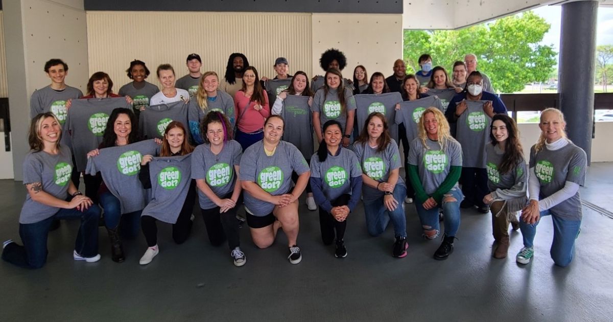 A group of diverse students on the Melbourne campus at EFSC having just completed Green Dot Training