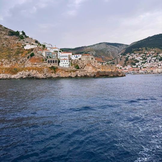 A view of the Greek landscape and housing from the water